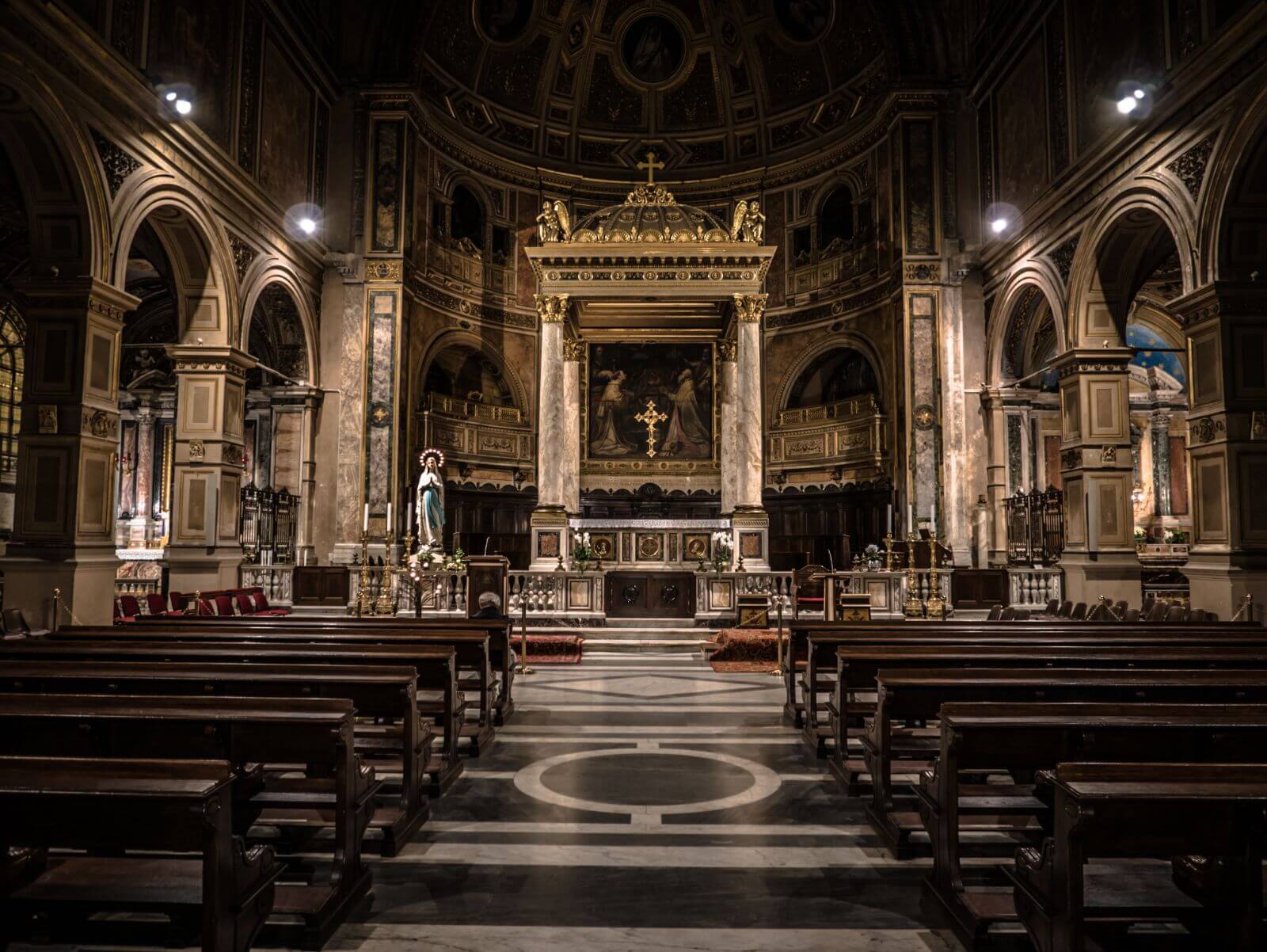 cathedral-interior-religious-with-benches-empty-in-back-218480